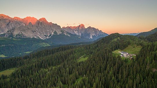 Sesto Dolomites at dawn and malga Coltrondo from above