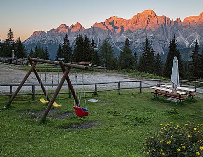 Sunrise on Rinfreddo hut located in Val Padola - Comelico Superiore, in a panoramic position on the Sesto Dolomites and Mount Popera
