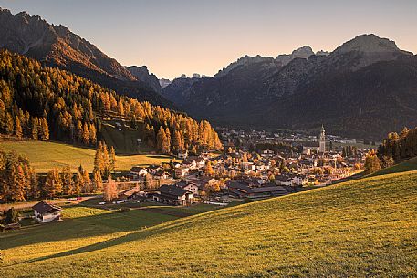 Panoramic view from San Silvestro valley to Dobbiaco at sunset with Braies Dolomiten on background