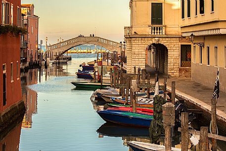 Sunset from Canal Vena to Grassi palace and Vigo bridge, Chioggia, Italy