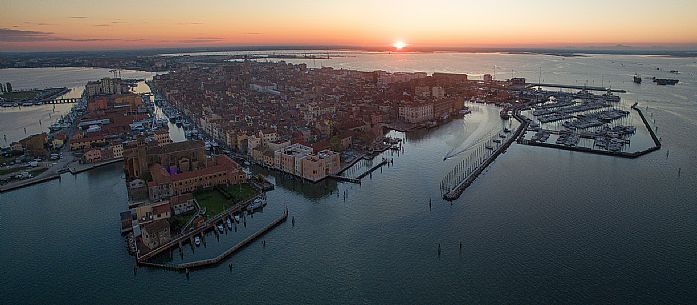 Chioggia, the harbor and the Venice lagoon from above at sunset, Chioggia, Italy