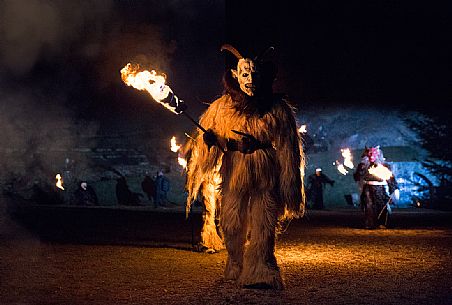 Krampus during the traditional festival. The Krampus are men-wild goats and very disturbing that roam the streets in search of children 