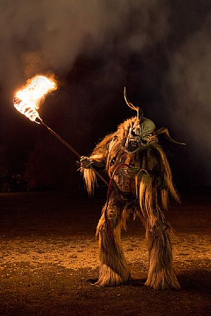 Krampus during the traditional festival. The Krampus are men-wild goats and very disturbing that roam the streets in search of children 