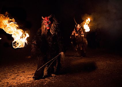 Krampus during the traditional festival. The Krampus are men-wild goats and very disturbing that roam the streets in search of children 