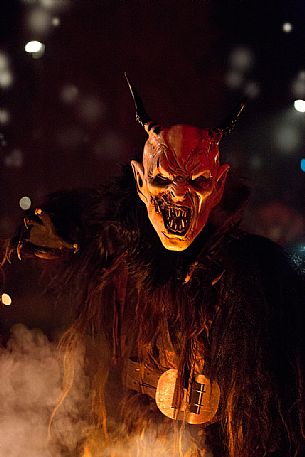 Krampus during the traditional festival. The Krampus are men-wild goats and very disturbing that roam the streets in search of children Krampus during the traditional festival. The Krampus are men-wild goats and very disturbing that roam the streets in search of children