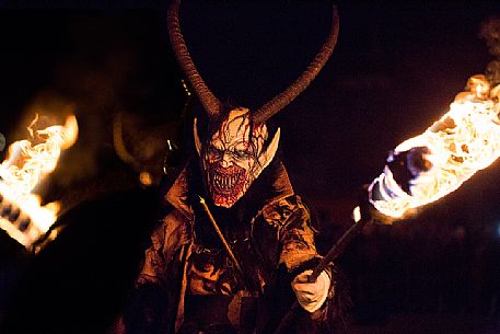 Krampus during the traditional festival. The Krampus are men-wild goats and very disturbing that roam the streets in search of children 