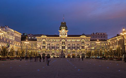 Unity of Italy Square or Piazza Unit d'Italia) with the Town Hall on background at Christmas time, Trieste, Italy