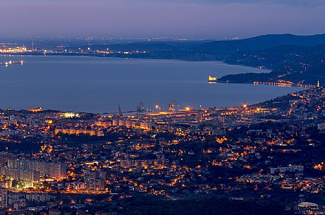 View from above of Trieste and Miramare castle at twilight, Italy