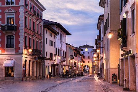 Corso Roma and the Torre Occidentale, historical centre of Spilimbergo at sunset, Italy 