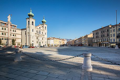 Gorizia's square with the Saint Ignazio church illuminated by early morning light, Friuli, Italy