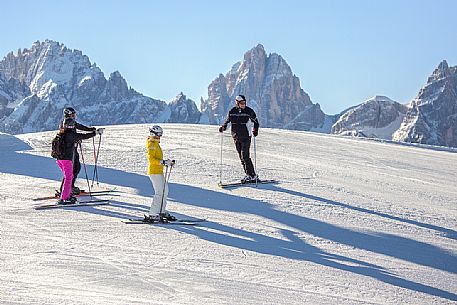 Group of skiers on Mount Elmo, in the background the Croda Dei Toni in the 
dolomites of Sesto natural park, Pusteria valley, Italy