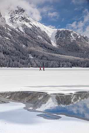 Cross country skiing on Lake of Anterselva, Pusteria Valley, Italy