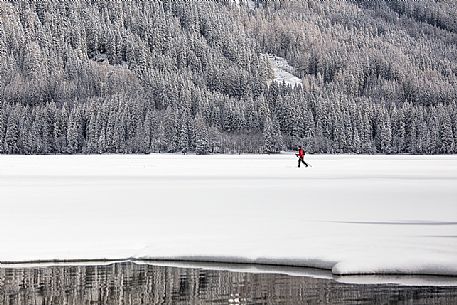 Cross country skiing on Lake of Anterselva, Pusteria Valley, Italy