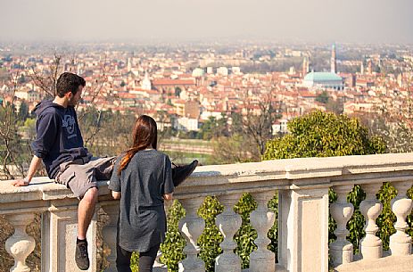 Couple of guys admires the view from the square of the Sanctuary of Monte Berico, Vicenza, Italy Couple of guys admires the view from the square of the Sanctuary of Monte Berico, Vicenza, Italy