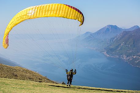 Paragliding runs from Mount Baldo above  Garda lake, Italy