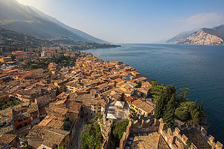 The small medieval village of Malcesine on the Garda lake photographed by the Scaligero castle, Italy