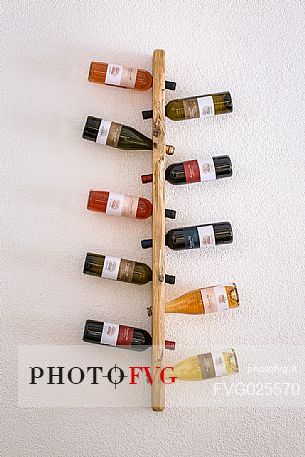 Wine rack in the distillery of Francesco Poli in Santa Massenza, Valley of Lakes, Trentino, Italy
