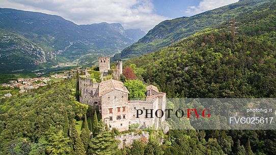 Castle Madruzzo from above, a medieval castle set on a rocky hill overlooking the homonymous village, Valley of Lakes, Valle dei Laghi, Trentino, Italy Castle Madruzzo from above, a medieval castle set on a rocky hill overlooking the homonymous village, Valley of Lakes, Valle dei Laghi, Trentino, Italy