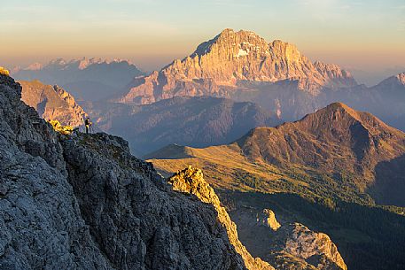 The photographer immortalizes the last lights on Mount Civetta from the Lagazuoi hut, Cortina D'Ampezzo, Dolomites, Italy