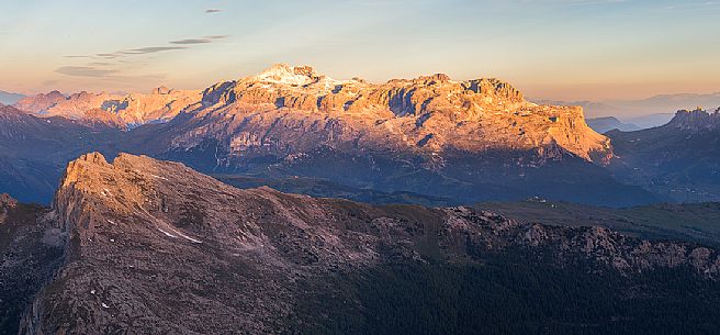 The Sella mountain group caressed by the early lights of the day, Cortina D'ampezzo, Dolomites, Italy