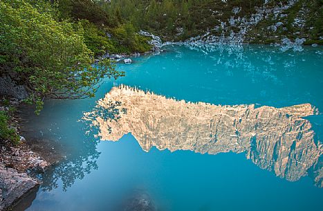 The Sorapiss group reflected on the Sorapiss lake, Cortina d'Ampezzo, Dolomites, Italy