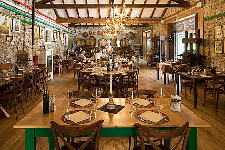 The dining room of the Osteria della Ribolla in Corno di Rosazzo, Friuli Venezia Giulia, Italy The dining room of the Osteria della Ribolla in Corno di Rosazzo, Friuli Venezia Giulia, Italy