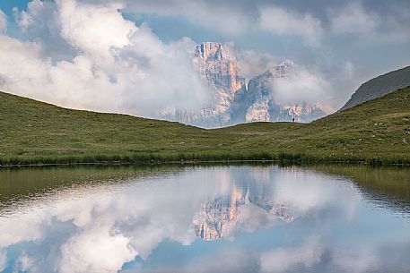 Pelmo mount reflected on Baste lake, Mondeval, Dolomites, Italy Pelmo mount reflected on Baste lake, Mondeval, Dolomites, Italy