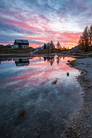 The Croda da Lago refuge - Gianni Palmieri located on the southern shore of Lake Federa, Cortina D'Ampezzo, Veneto, Italy The Croda da Lago refuge - Gianni Palmieri located on the southern shore of Lake Federa, Cortina D'Ampezzo, Veneto, Italy