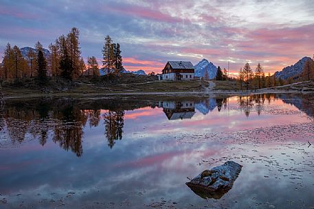 The Croda da Lago refuge - Gianni Palmieri located on the southern shore of Lake Federa, Cortina D'Ampezzo, Veneto, Italy The Croda da Lago refuge - Gianni Palmieri located on the southern shore of Lake Federa, Cortina D'Ampezzo, Veneto, Italy