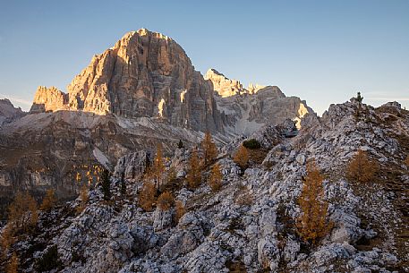The Tofana di Rozes illuminated by the last light of an autumn afternoon, Dolomites, Cortina d'Ampezzo, Italy