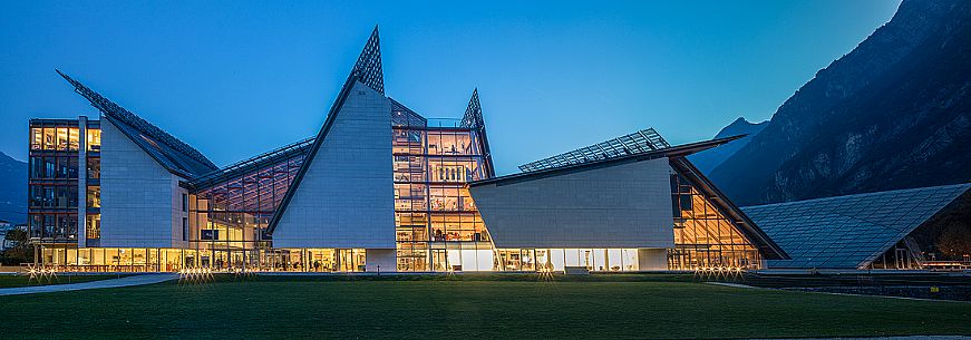 Panoramic view of the exterior of Muse, the museum of Science in Trento at twilight, Trentino Alto Adige, Italy Panoramic view of the exterior of Muse, the museum of Science in Trento at twilight, Trentino Alto Adige, Italy
