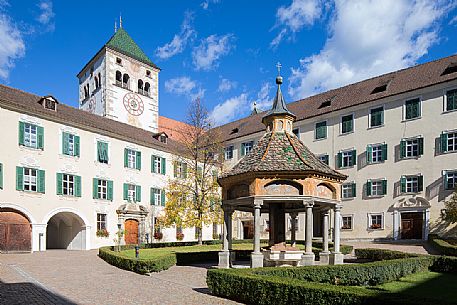 The courtyard of Novacella abbey or Neustift Abbey and the  well of Meraviglie, Varna, Valle Isarco, Trentino Alto Adige, Italy, Europe