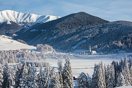 The village of Dobbiaco after an intense snowfall, Pusteria valley, dolomites, Trentino Alto Adige, Italy, Europe