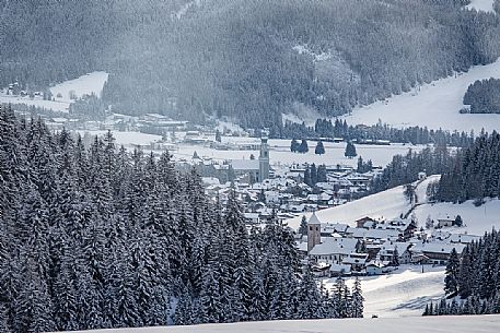 The village of Dobbiaco and San Silvestro valley after an intense snowfall, Pusteria valley, dolomites, Trentino Alto Adige, Italy The village of Dobbiaco and San Silvestro valley after an intense snowfall, Pusteria valley, dolomites, Trentino Alto Adige, Italy