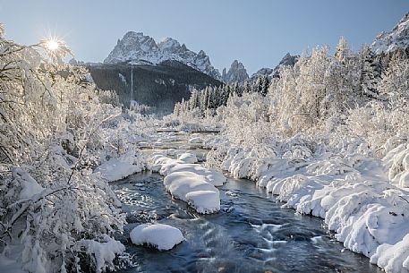 The snowy landscape of Moso, in the background the Sesto Sundial with the Croda dei Toni peaks, dolomites, Pusteria valley, Trentino Alto Adige, Italy, Europe