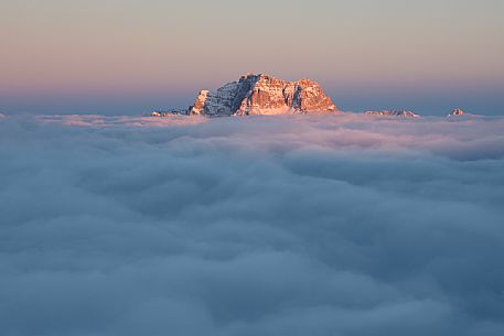 Sorapiss Mount above a sea of clouds at sunset, Cortina d'Ampezzo, dolomites, Veneto, Italy, Europe Sorapiss Mount above a sea of clouds at sunset, Cortina d'Ampezzo, dolomites, Veneto, Italy, Europe