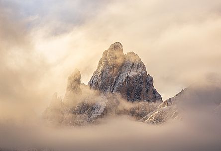 The Croda Dei Toni shrouded by the clouds at dawn, Sesto, Pusteria valley, dolomites, Trentino Alto Adige, Italy, Europe The Croda Dei Toni shrouded by the clouds at dawn, Sesto, Pusteria valley, dolomites, Trentino Alto Adige, Italy, Europe
