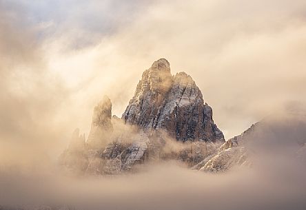 The Croda Dei Toni shrouded by the clouds at dawn, Sesto, Pusteria valley, dolomites, Trentino Alto Adige, Italy, Europe