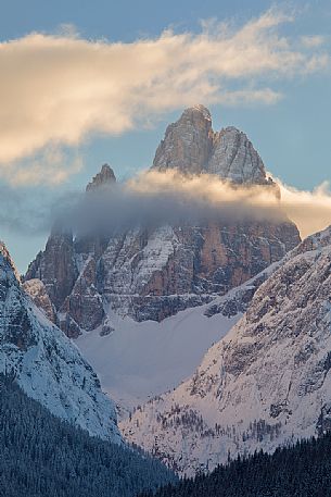 The Croda Dei Toni shrouded by the clouds at dawn, Sesto, Pusteria valley, dolomites, Trentino Alto Adige, Italy, Europe