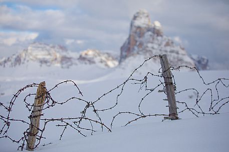 Traces of the great war from Piana Mount, on background the Tre Cime di Lavaredo and the Dolomites of Sesto, Auronzo di Cadore, Veneto, Italy