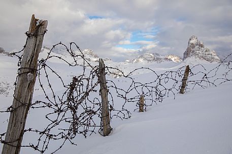 Traces of the great war from Piana Mount, on background the Tre Cime di Lavaredo and the Dolomites of Sesto, Auronzo di Cadore, Veneto, Italy