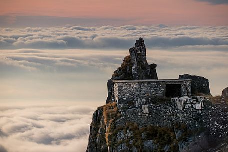 Low clouds over Cervaiole, marble quarry in Versilia, Tuscany Low clouds over Cervaiole, marble quarry in Versilia, Tuscany
