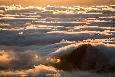 Low clouds over Folgorito Moutain from marble quarry in Versilia, Tuscany, Italia Low clouds over Folgorito Moutain from marble quarry in Versilia, Tuscany, Italia