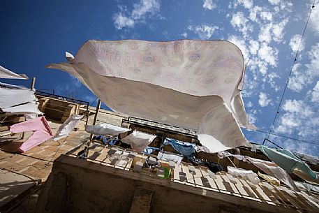 Laundry hanging in the sun to dry, La Valletta city, Malta Laundry hanging in the sun to dry, La Valletta city, Malta
