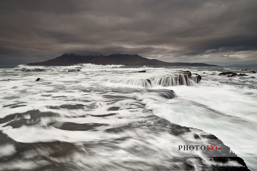 Singing Sands bay, Isle of Eigg with the Rum mountains in the distance