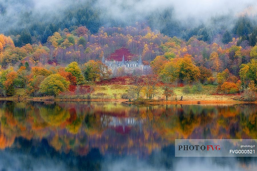 Tigh Mor hotel surrounded by fog in autumn in the Trossachs