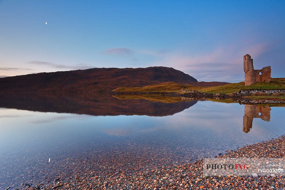 Standing on a rocky promontory jutting out into Loch Assynt in Sutherland, north west Highland, Scotland, Ardvreck Castle is a ruined castle dating from the 16th century