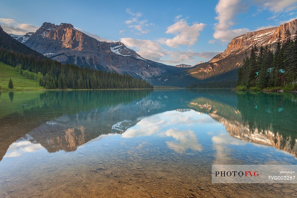 Reflections into the Emerald Lake water at late Afternoon