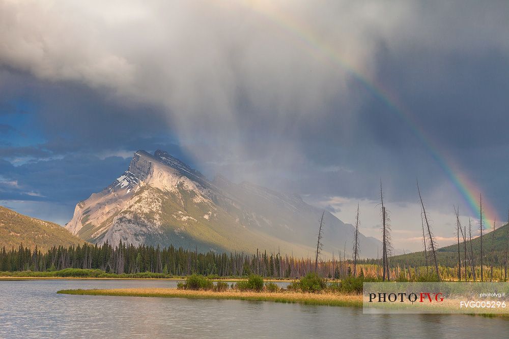 Storm and rainbow above Mount Rundle at Vermillion lake