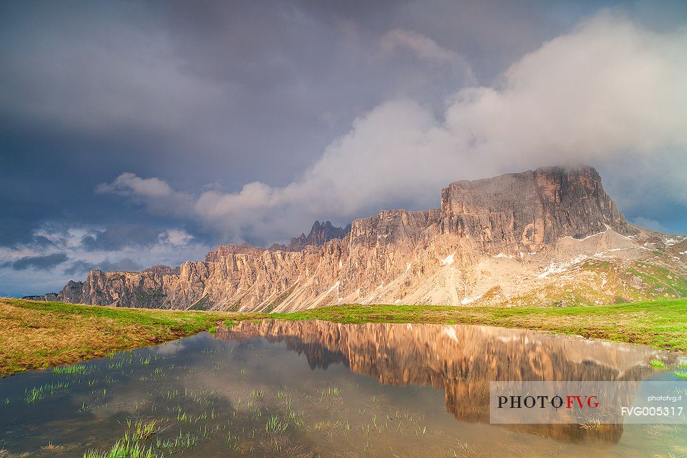 Lastoni of Formin reflected in a puddle Giau